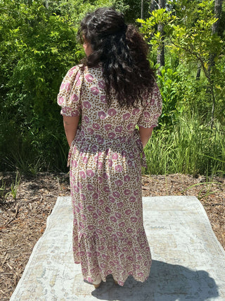 Orchid floral midi dress with button front and scallop trim, featuring a fitted bodice and flowing skirt