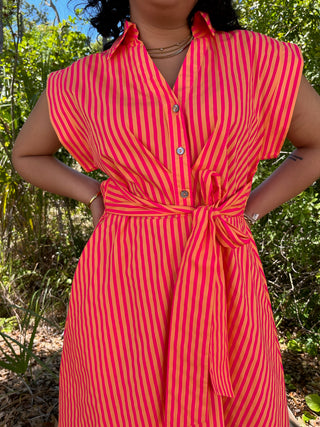 Hot pink and orange vertical striped sleeveless midi dress with tie waist and button front.