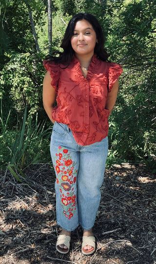 Entro embroidered sleeveless top with ruffle collar in three colors, perfect for stylish comfort.