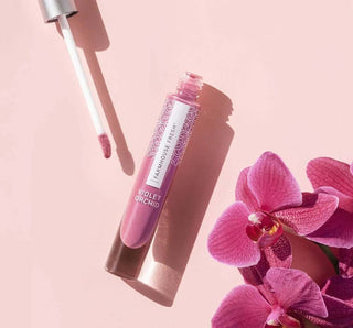 FHF Vitamin Glaze Lip Gloss in Violet Orchid - Luxurious oil-infused shine for vibrant, nourished lips.
