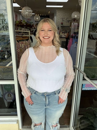 White round neck, long sleeve layering top with dainty dot design, perfect for stylish layering and a chic look.