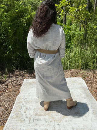 Blue striped midi dress with delicate embroidery and a flattering silhouette