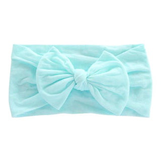 Aqua nylon headband with centered bow and textured fabric detail.
