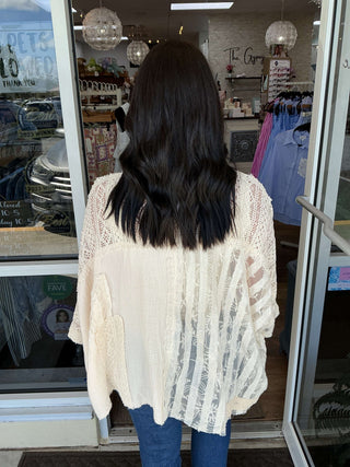 POL Natural Ivory Mixed Fabric Oversized Top on mannequin offering a relaxed, stylish fit for a chic, modern look.