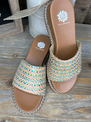 Multicolor woven wedge sandals with tan footbed and decorative stitched trim detail.

