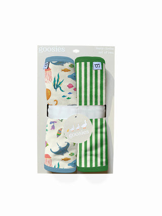 Two burp cloths featuring ocean creatures and green stripes design in package.
