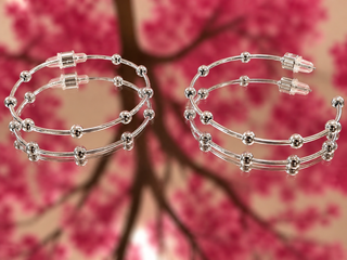 Silver bead accent hoop earrings with triple-strand design and spherical bead details.
