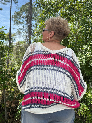 Cream crochet top with raspberry and navy horizontal stripes, loose fit, short sleeves.
