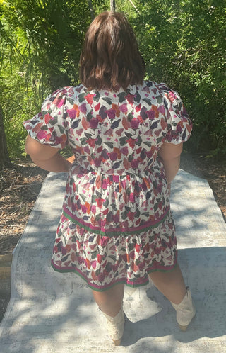 Plum floral print dress with bubble sleeves and a stylish band accent