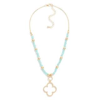 Elegant Aqua Beaded Clover Pendant Necklace in vibrant blue hues, perfect for adding a touch of charm to any outfit.