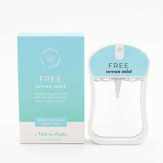 FREE Ocean Mist Mixologie Moisturizing Body Mist bottle with fresh, aquatic design on a white background.