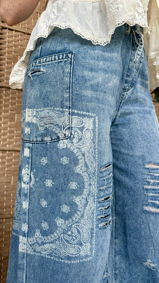 Alternate view of The Wanderer Washed Denim Distressed Wide Leg Pants
