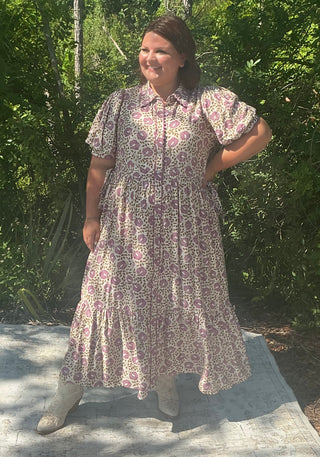 Orchid floral midi dress with button front and scallop trim, featuring a fitted bodice and flowing skirt