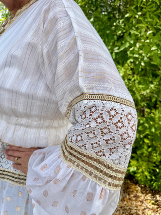 Ivory parasail kimono with gold-threaded stripes and cream lace cuff trim on three-quarter sleeves.

