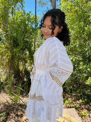 Ivory linen kimono with tan embroidered details and lace trim on sleeves and hem.
