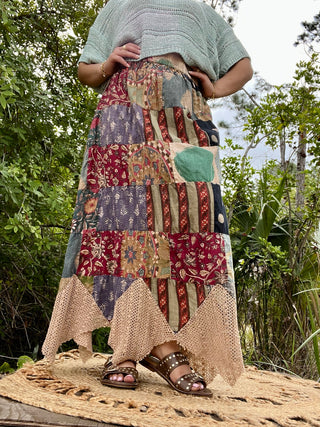 Patchwork maxi skirt with mixed burgundy, navy, tan and sage fabrics in floral and striped patterns.
