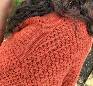 Light gray waffle knit short sleeve sweater in a relaxed boxy fit