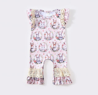 Vintage-inspired Antique Bunny Ruffle Baby Romper with floral bunny prints and delicate ruffled details, perfect for infants.