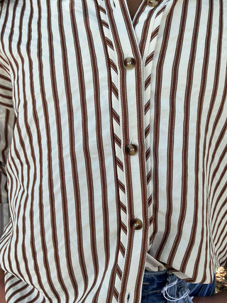 Light blue textured stripe long sleeve button-down shirt with a relaxed fit