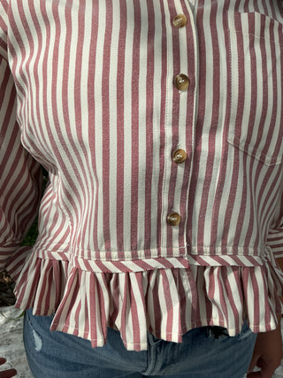 Light blue and white striped button-up top with a ruffle hem and short sleeves