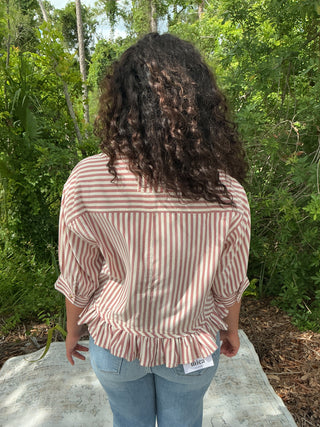 Light blue and white striped button-up top with a ruffle hem and short sleeves