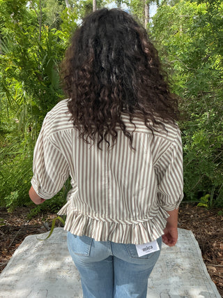 Light blue and white striped button-up top with a ruffle hem and short sleeves