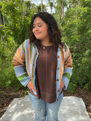 Multicolor boho cardigan with button front and earthy tones, perfect for layering in cooler weather