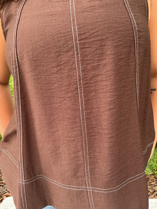 Light gray sleeveless tank top with contrast stitching, perfect for layering or casual wear
