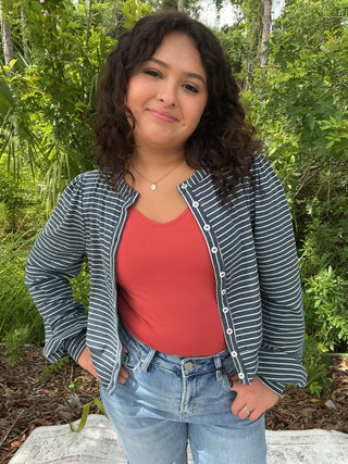 Lightweight denim knit cardigan with stripes and a button front, perfect for layering in casual outfits