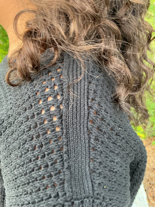 Light gray waffle knit short sleeve sweater with a relaxed boxy fit