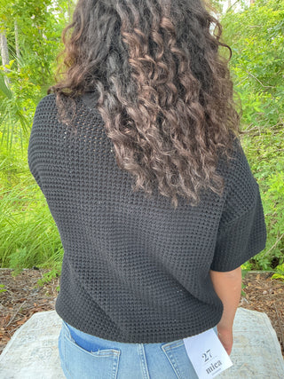 Light gray waffle knit short sleeve sweater with a relaxed boxy fit