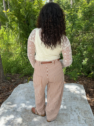 Caramel striped gypsy fit drawstring pants with a relaxed silhouette and wide legs