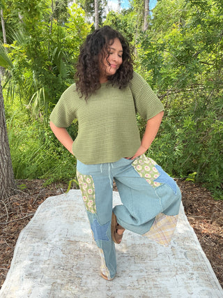 Light blue washed denim wide leg palazzo pants with a stylish patchwork design