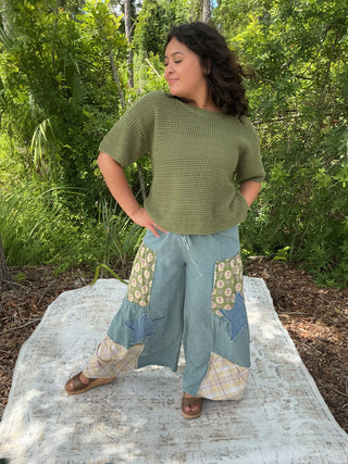 Light gray waffle knit short sleeve sweater in a relaxed boxy fit