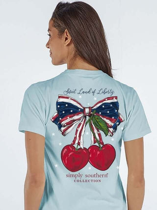 Simply Southern Sweet Land of Liberty Tee on final sale, featuring patriotic graphics and vibrant red, white, and blue colors.
