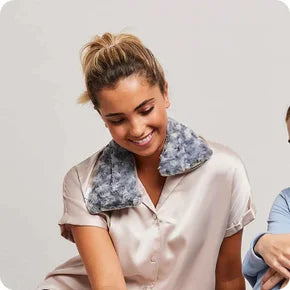 Microwavable Warmies Curly Gray Neck Wrap for soothing warmth and comfort. Ideal for relaxation and stress relief.