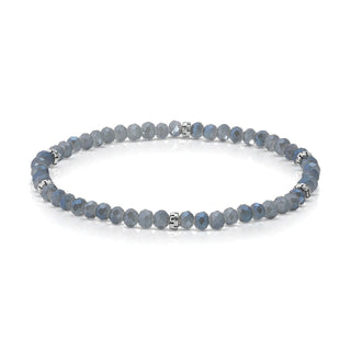Gray faceted beaded bracelet with silver spacer accents on elastic band.
