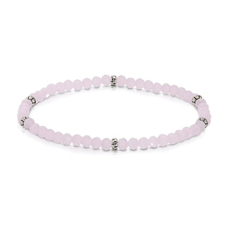 Pink beaded bracelet with silver spacer accents and clasp detail.
