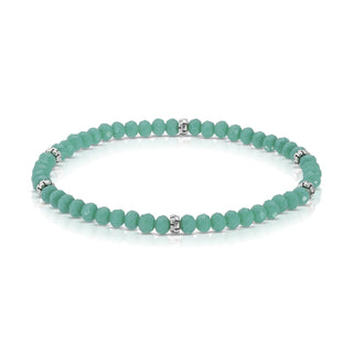 Turquoise beaded bracelet with silver spacer accents and elastic cord.
