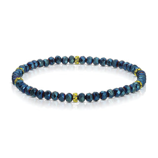 Navy blue beaded bracelet with gold-tone accent spacers and clasp.
