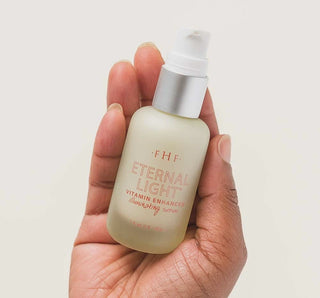 Eternal Light® Vitamin Serum by FHF - Boosts radiance and nourishes skin for a luminous glow. Sleek glass bottle design.