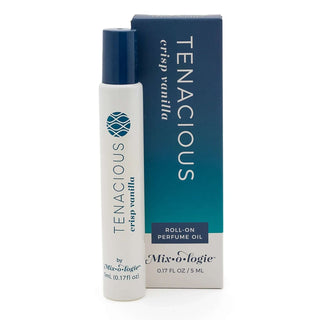 Mixologie TENACIOUS Crisp Vanilla Rollerball Perfume with sleek design, 5 mL bottle on wooden surface for luxurious scent
