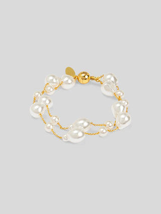 Baroque pearl duo chain magnetic bracelet with white pearls, gold-tone chain and sphere clasp.
