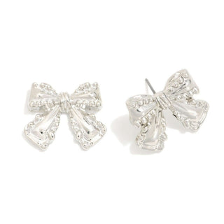 Alt text: "Chunky Silver Bow Post Earrings with Satin Finish on White Background