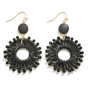 Alt text: "Stylish black raffia wrapped hoop drop earrings, perfect for a chic and modern accessory statement.