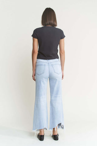 Women's MICA W3522LT super high-rise light wash distressed straight-leg jeans, styled with casual sneakers.