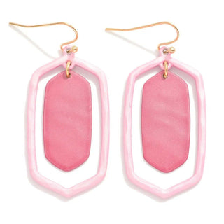 Stylish fuschia hexagon nesting earrings with gold accents, ideal for adding a vibrant touch to any outfit.