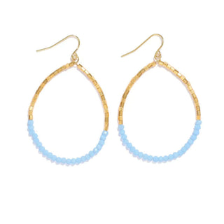 Gold and Periwinkle Beaded Teardrop Earrings displayed on a neutral background, highlighting intricate beadwork and elegant design.