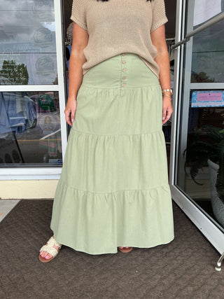 Light Olive Tiered Button Maxi Skirt on Final Sale, showcasing elegant layers and front button details. Perfect for chic style.