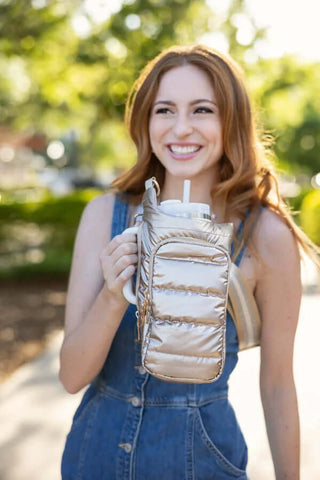 Stylish HydroBag® HANDLE™ purse with crossbody strap, available in multiple colors for versatile and chic fashion.